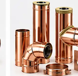 Sistema fumario inox doppia parete ramato: tubo interno inox, coibentazione e rivestimento esterno finitura rame.